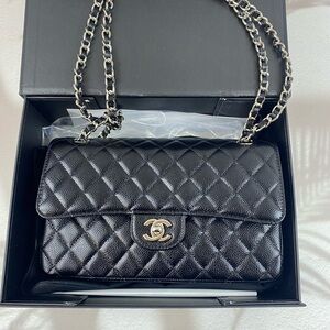 CHANEL Black Quilted Shoulder Bag with Silver Chain